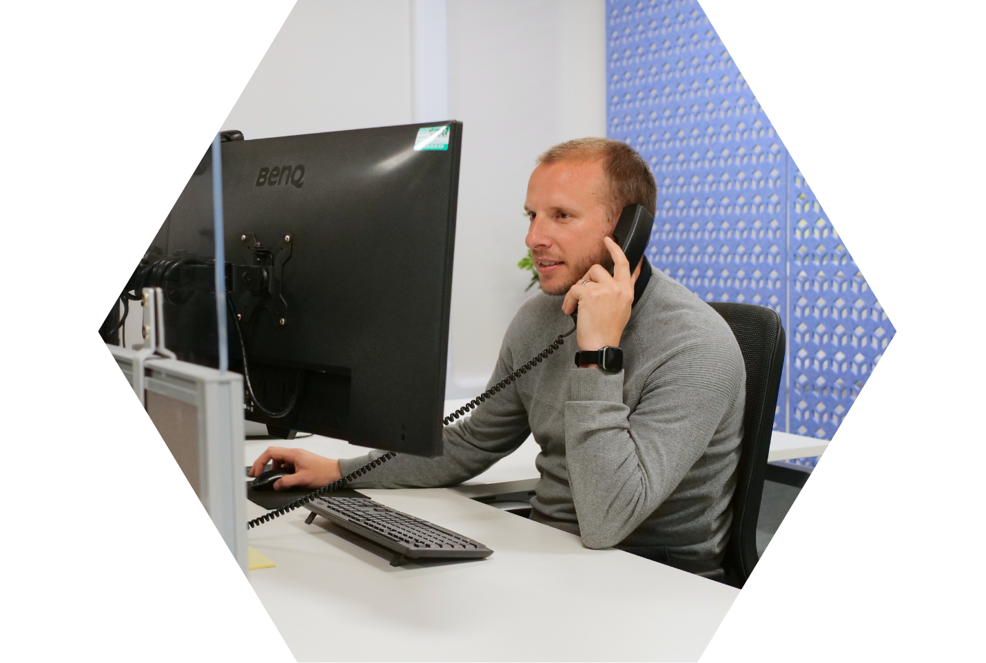 Account Manager on phone call with customer