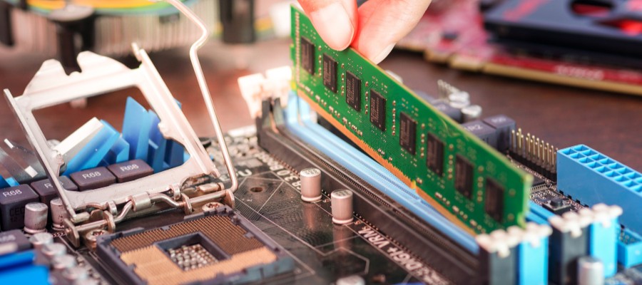 memory being inserted into a motherboard