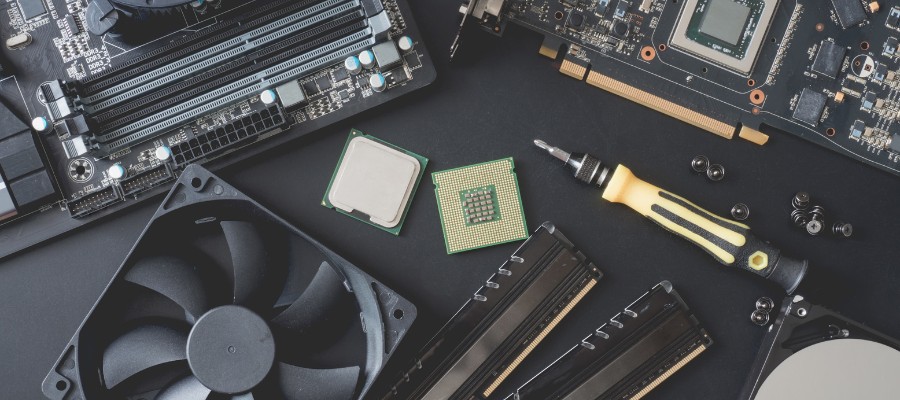 computer components, including memory, laid out on a table