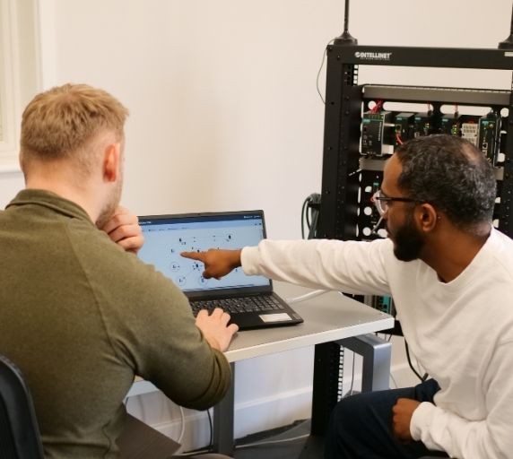 Technical Engineers using Network Management Software