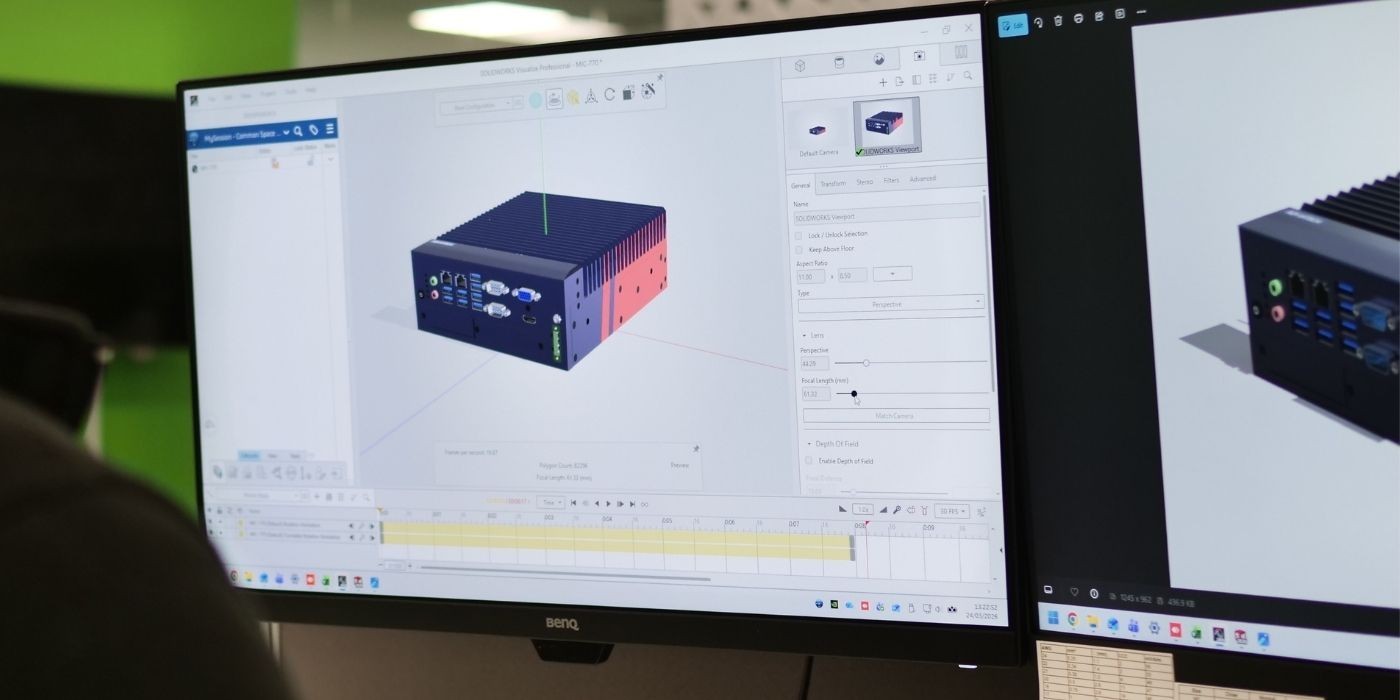 Engineer designing a custom embedded computer using CAD software.
