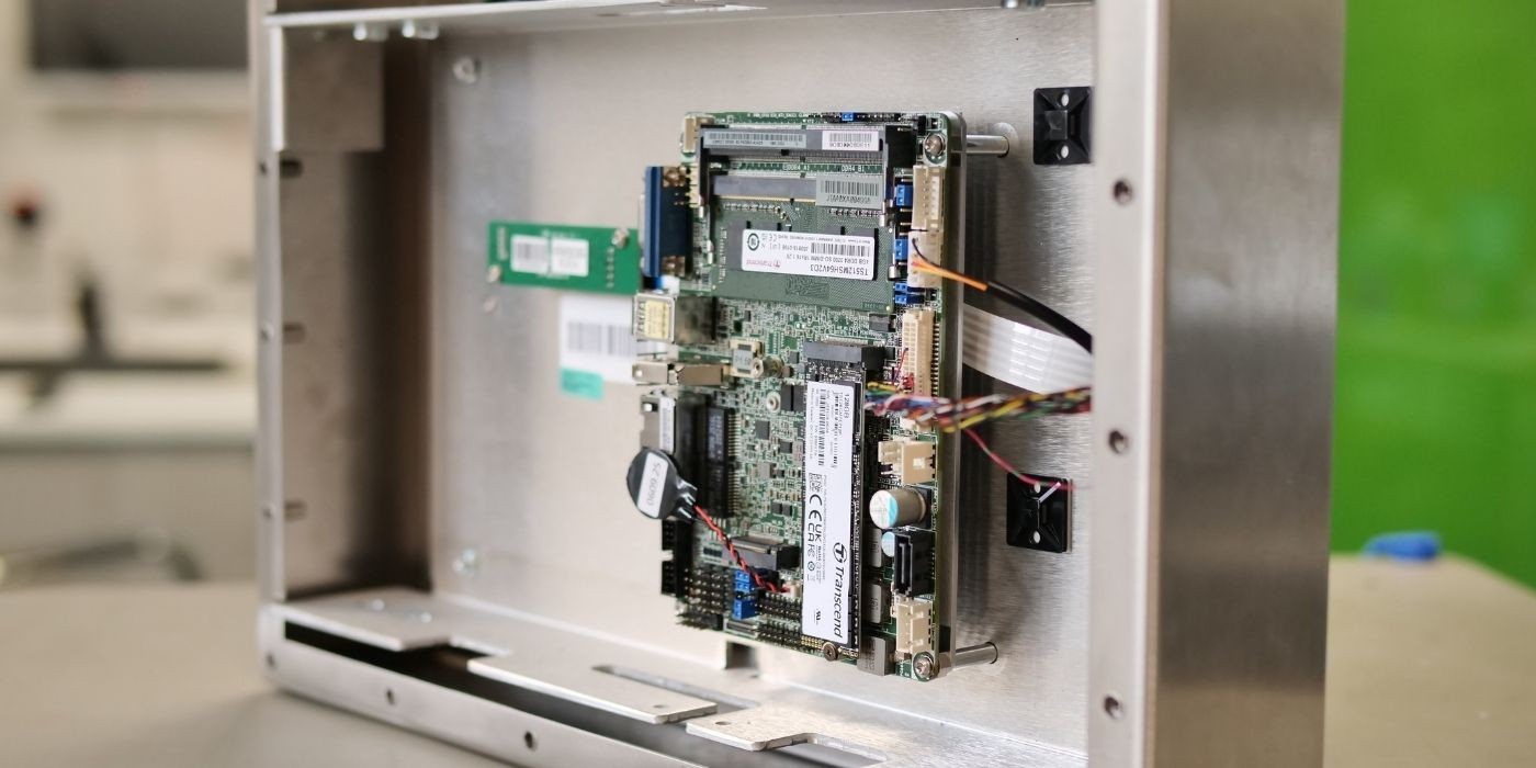 A view of the inside of a custom industrial display, where the board is visible.